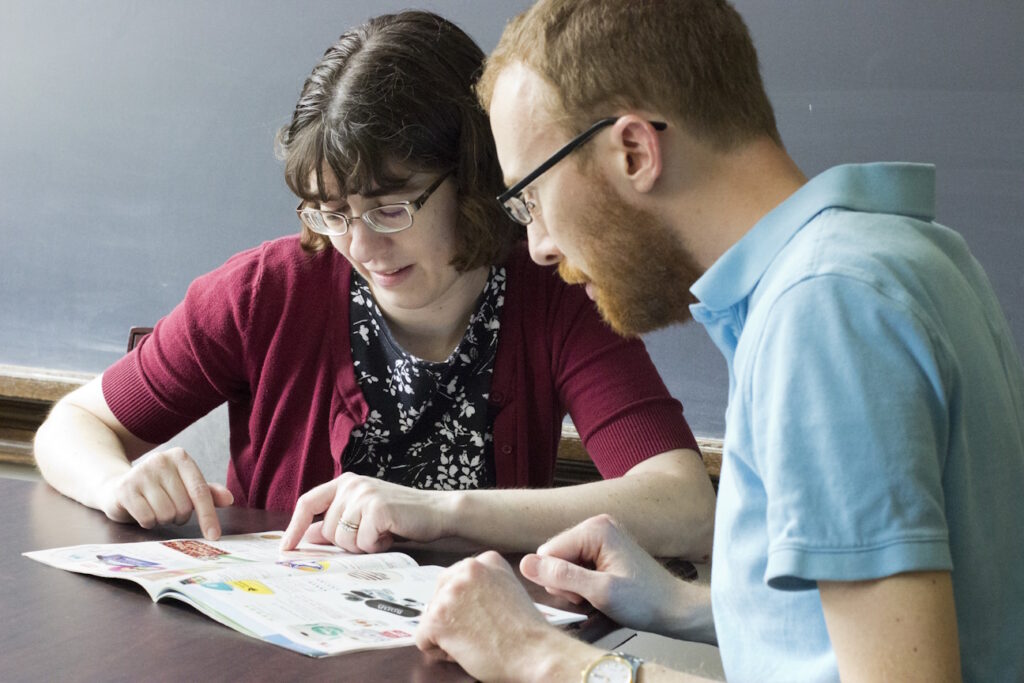 Image of Ruth and Eric looking at a document